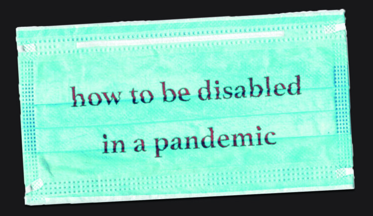 A light blue surgical face mask on a dark background. A message printed in red on the fabric reads, How to be Disabled in a Pandemic.